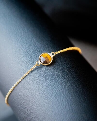 Gouden edelsteen armband oranje-bruine ‘Tijgeroog’ van Goud op Zilver
