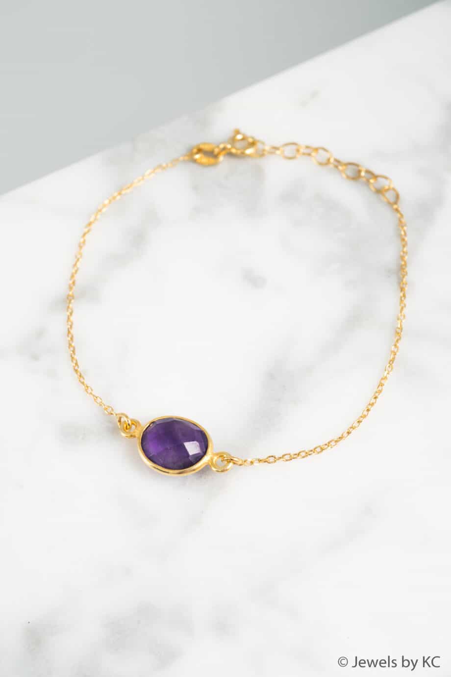 Gouden edelsteen armband Amethist paarse steen minimalistisch